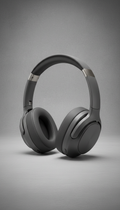 A perfectly centered shot of Sonic Serenity over-ear headphones on a neutral Urban Slate background. The slightly elevated...